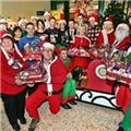 Morrisons staff and Teign Estuary Rotary collect goodies for HITS FoodBank&#39;s Christmas hampers.