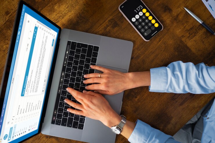 top view woman typing laptop 23