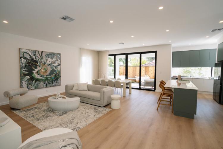 Modern living room by Normus Homes, showcasing a stylish and spacious interior built by expert new home builders Adelaide. Modern living room by Normus Homes, showcasing a stylish and spacious interior built by expert new home builders Adelaide.